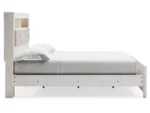 Altyra King Panel Bed with Upholstered Bookcase Headboard - Image 4