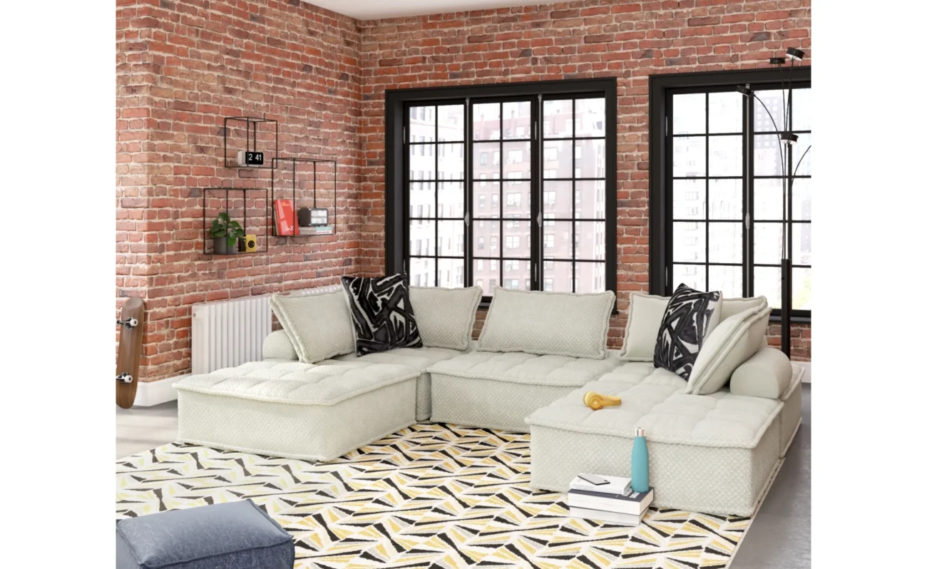 Comparison of solid wood, upholstery fabric, and top-grain leather furniture finishes.